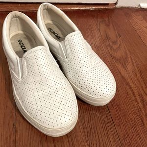 White slip-on shoes. Light use. Purchased from Lucy Avenue